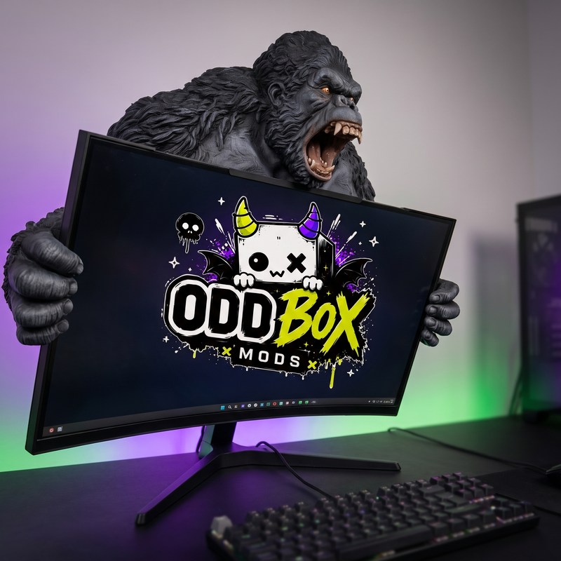 Kong Monitor Hugger, a silverback gorilla gripping the top of a gaming monitor on a clean desk